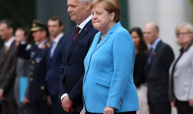 Angela Merkel dridhet për herë të tretë