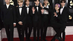Kostumet e shtatë anëtarëve të “BTS” do të shiten në ankand