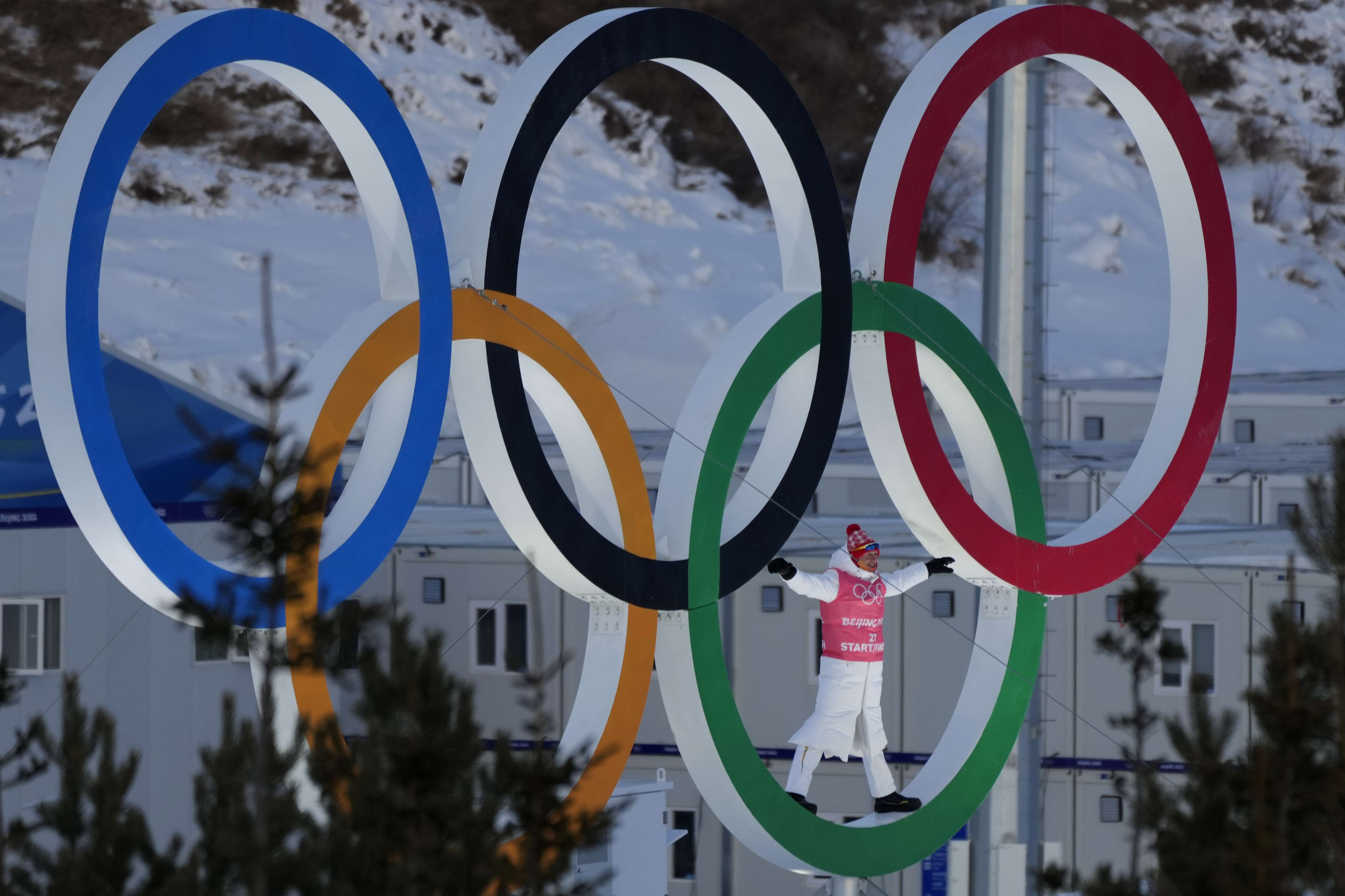 Vëmendja olimpike kthehet në Kinë për Lojërat e goditura nga koronavirusi