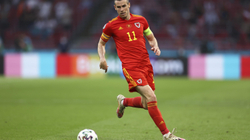 Bale ia siguron një pikë Uellsit në rikthimin në Botëror 