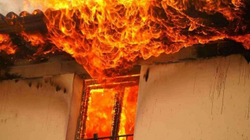 A house burns in Vushtrri
