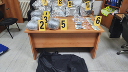 They were carrying around 34 kg of marijuana on their backs, one is arrested and the other escapes