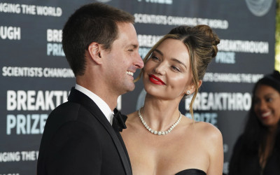 Miranda Kerr dhe burri i saj, i cili është CEO i aplikacionit "Snapchat"
