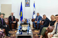 Gazmend Hoxha dhe Brendan Collins