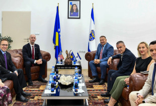 Gazmend Hoxha dhe Brendan Collins