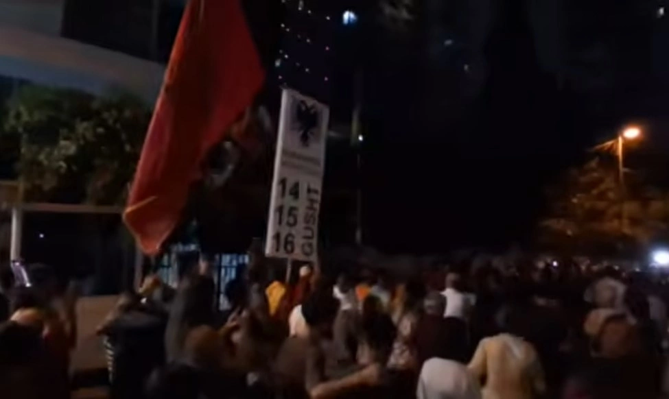Protesters in Tirana move in front of the Serbian and Ukrainian Embassies, chanting "KLA, KLA"
