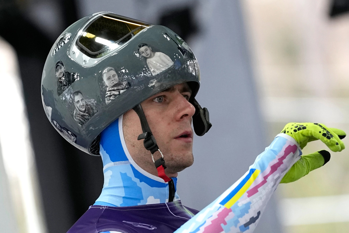 IOC ja ia ndalon ukrainasit helmetën me fotografi të viktimave